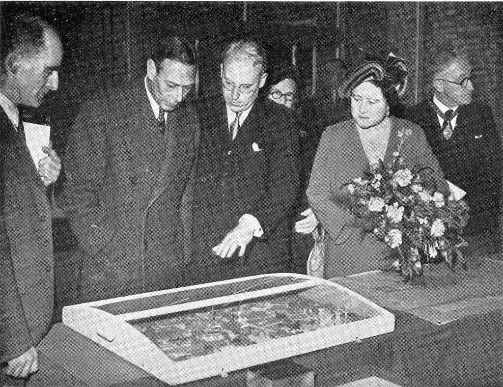 Image showing King George VI and his wife Queen Elizaeth looking at a model of part of Coventry City Centre