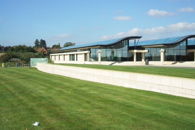 Colour image of the Network Rail building showoing wavy blue rooves.