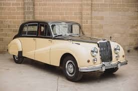 Coloured image of a 1957 car.