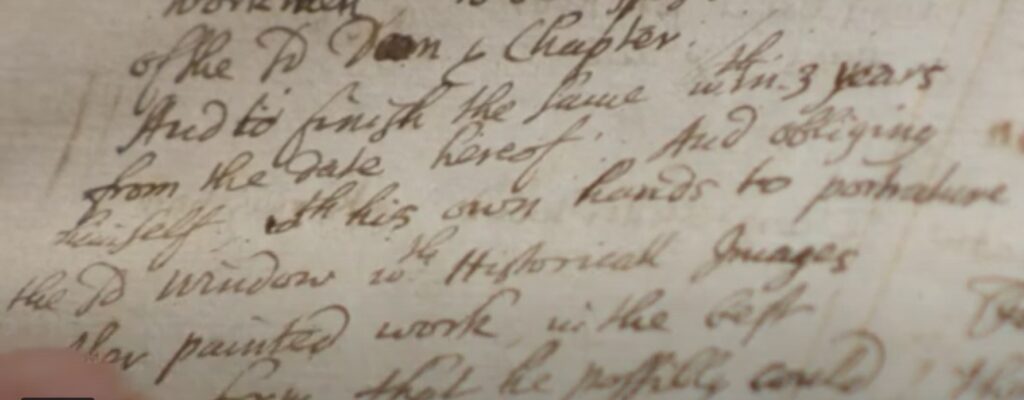 Image of a hand written document in brown ink.
