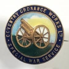 A coloured circular image showing a field gun with text aroud it reading Coventry Ordnance Works: Special War Service